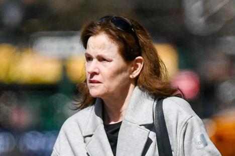 Eighties movie icon looks unrecognizable on rare outing in New York – can you guess who she is?
