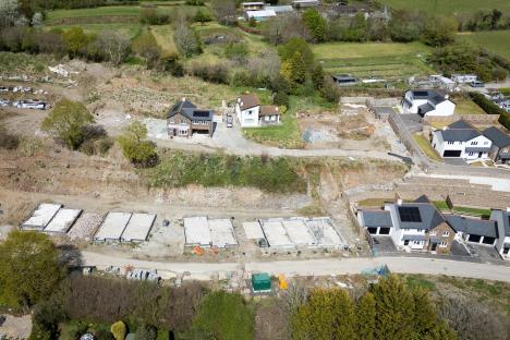 Aerial view of an unfinished housing estate.