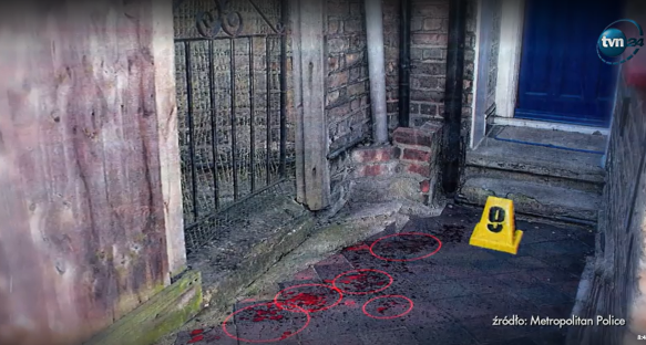 Crime scene photo showing blood splatter marked with red circles and a yellow evidence marker.