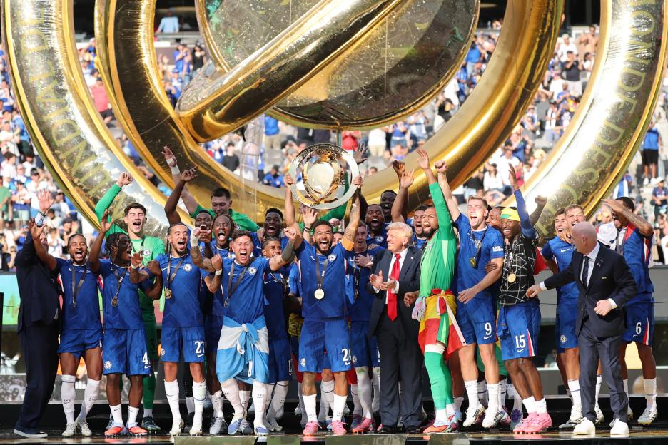 Chelsea FC team celebrating FIFA Club World Cup victory with Donald Trump and Gianni Infantino.