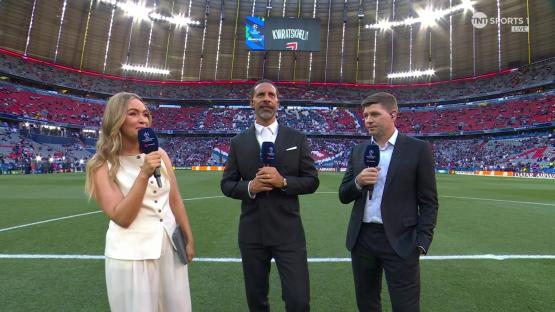 Laura Woods, Rio Ferdinand, and Steven Gerrard at a soccer stadium.