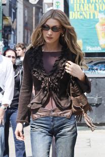 Bella Hadid leaving a chicken shop.