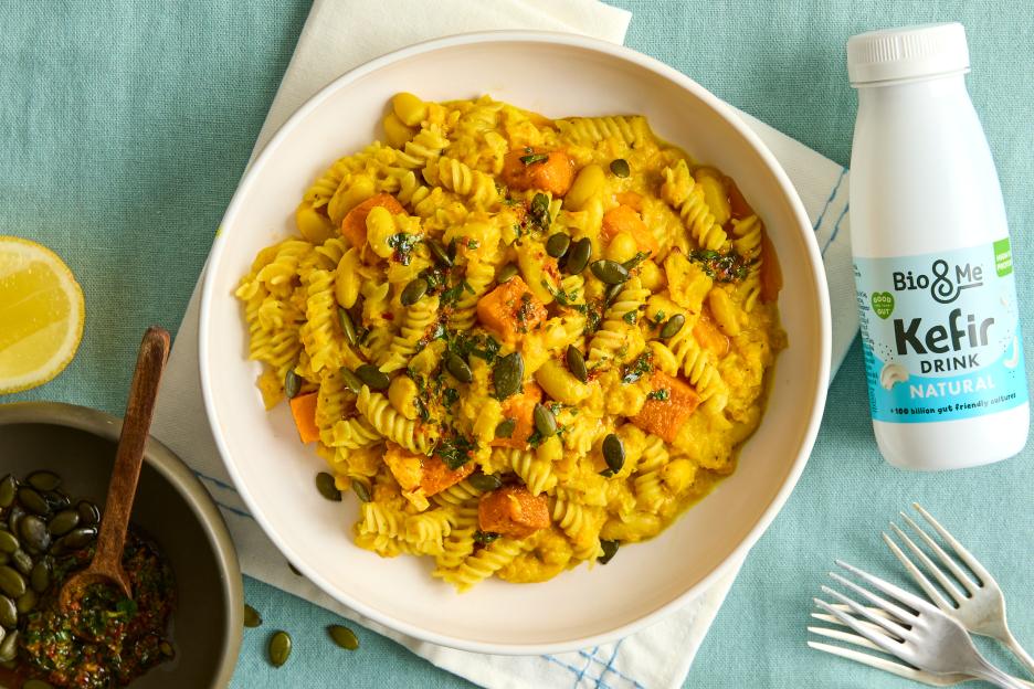 Pasta with butternut squash, white beans, and pumpkin seeds.