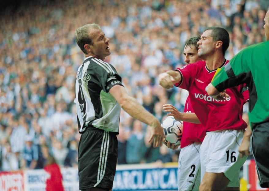 Man Utd captain Roy Keane takes a swing at Newcastle captain Alan Shearer during a football match.
