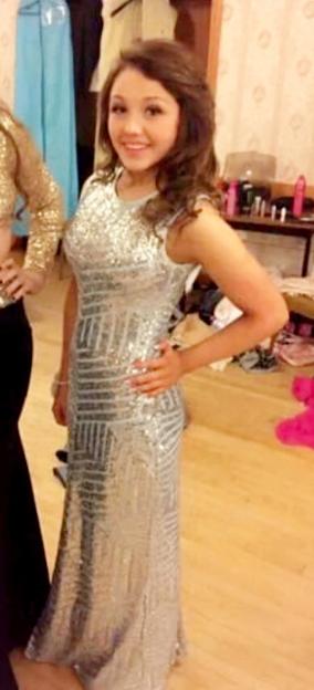 Megan Byrne in a sparkling silver dress.