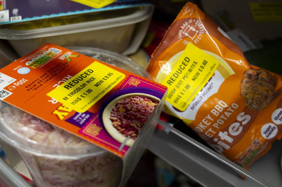 Reduced-price microwave rice and sweet potato bites in a supermarket.