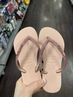 Pair of pink glitter Havainas flip-flops.