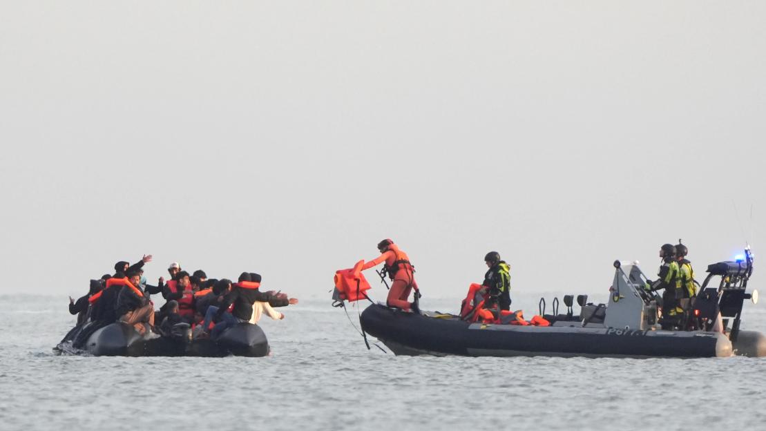 French coastguard hand boat full of migrants life jackets as dozens more set sail for UK after ‘one in one out deal’