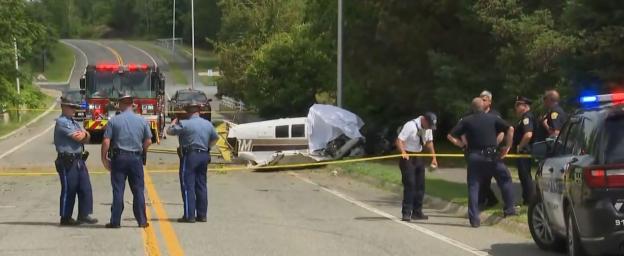 Light plane crashes near Boston leaving one person dead and second fighting for their life as feds launch probe