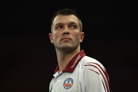 Madars Razma of Latvia at the PDC World Darts Championship.