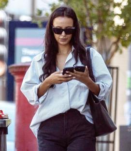 BGUK_3234674 - *EXCLUSIVE* London, UNITED KINGDOM - *WEB MUST CALL FOR PRICING* - TV Presenter Maya Jama seems in busy mode stopping to for a quick lunch and holding two phones in hand during the glorious spring sunshine out in London. After recently confirming the rumours of a romance with footballer Ruben Dias after months of speculation, Maya stepped out in the sunshine looking casually chic in her oversized shirt and shorts coupled with her cool sunglasses. Pictured: Maya Jama BACKGRID UK 11 MAY 2025 UK: +44 208 344 2007 / uksales@backgrid.com USA: +1 310 798 9111 / usasales@backgrid.com *Pictures Containing Children Please Pixelate Face Prior To Publication*