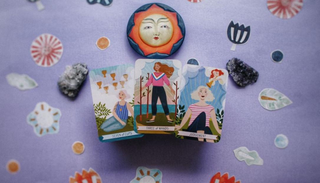 Three tarot cards: Seven of Cups, Three of Wands, and Judgement.