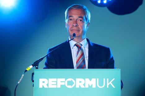 Nigel Farage speaking at a Reform UK event.