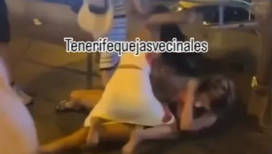 Shock moment two Brit women brawl on Tenerife street as leering yobs spur them on sparking local fury on holiday island