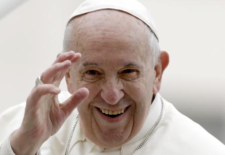 Pope Francis waving.