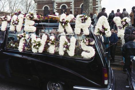 The Funeral of Ronnie Kray attended by his twin Reggie and other Kray family members. Ronnie Kray was eventually certified insane and lived the remainder of his life in Broadmoor Hospital, Crowthorne, dying on 17 March 1995 of a heart attack at the age of 61. He was buried at Chingford Mount Cemetery in East London where their mother was interred in the Kray family plot. Crowds lined the streets of East London to pay their respects to the notorious criminal, Reg's security team controlled the crowds headed by Dave Courtenay. 29.03.1995