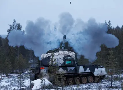 Self-propelled howitzer firing in Lapland, Finland.