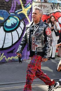Robbie Williams filming a music video in London.