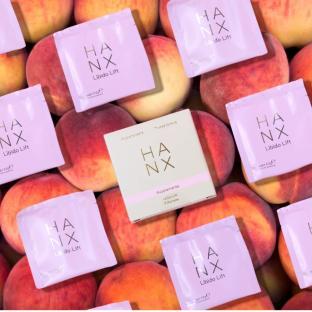 HANX Libido Lift supplements surrounded by peaches.
