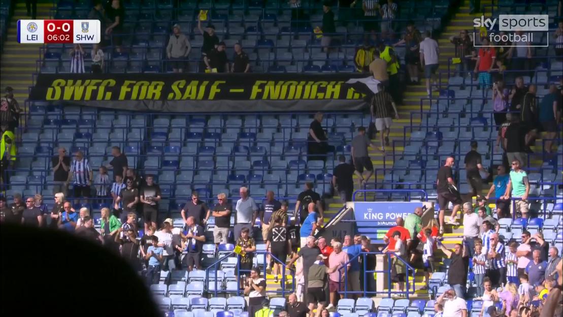 Leicester City fans applaud Sheffield Wednesday fans protesting the club's sale.