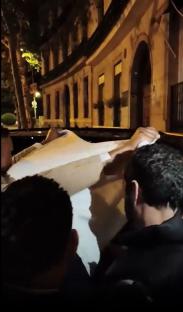 Ronaldo being helped into a car.
