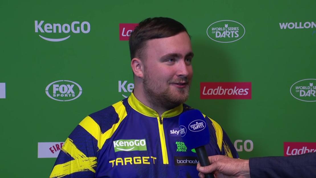 Darts player being interviewed.