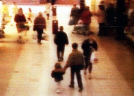 Blurry surveillance footage of James Bulger's abduction.
