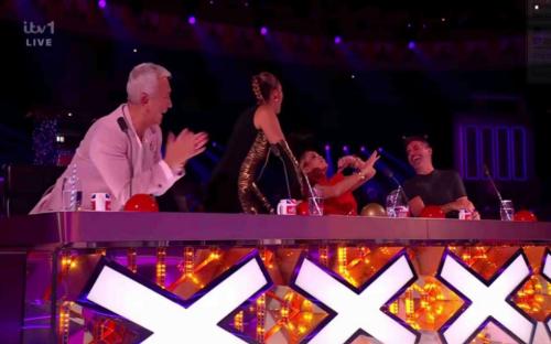 Britain's Got Talent judges reacting during a live show.