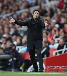 Mikel Arteta, Arsenal manager, looking frustrated on the sidelines.