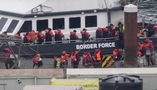 Migrants arriving in Dover, UK, on a Border Force vessel.