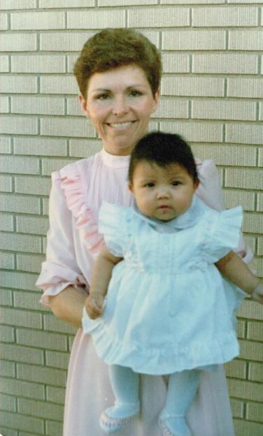 Melaina Rogers, adopted by Cate and Mike Larsen, held by Cate.