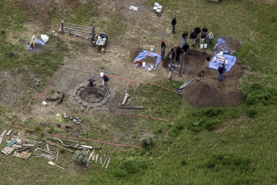 Aerial view of investigators searching for human remains.