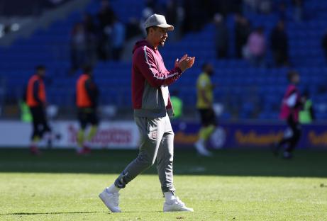 Callum Robinson of Cardiff City applauding fans.