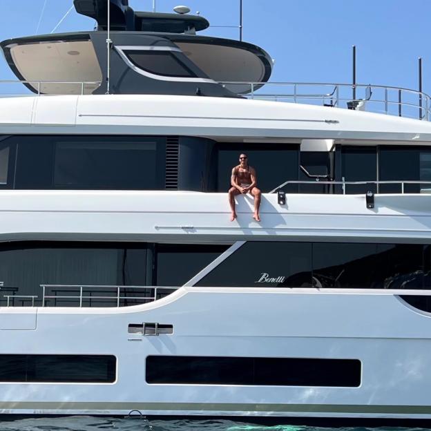 Zlatan Ibrahimovic sitting on a Benetti yacht.