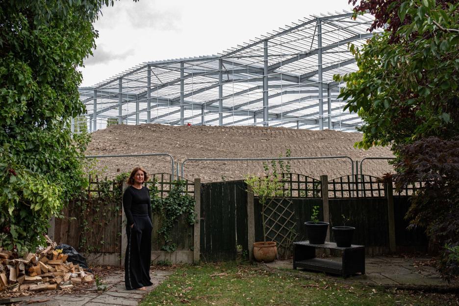 'It's like a cruise ship in our garden': New 60ft warehouses loom over homes