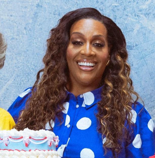 Alison Hammond, Noel Fielding, Prue Leith and Paul Hollywood holding decorative cakes.