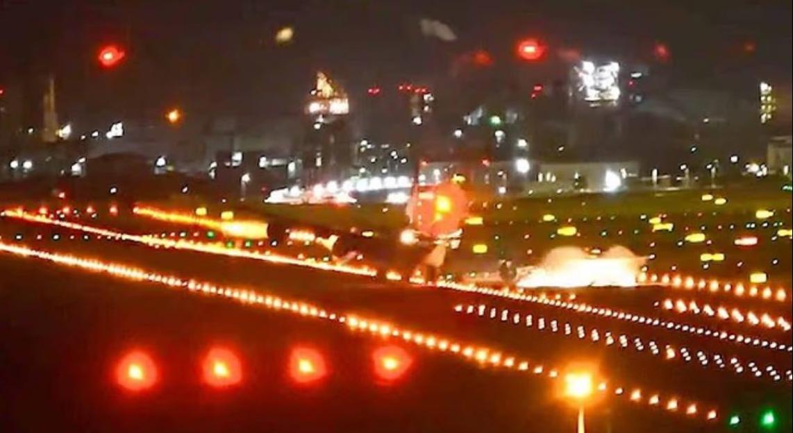 Terrifying moment Boeing 747 wing smashes into runway during typhoon landing sending sparks flying
