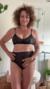 Woman in leopard print lingerie.