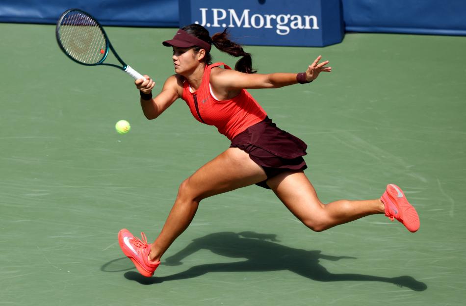 Emma Raducanu playing tennis.