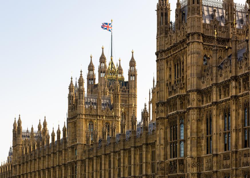 Houses of Parliament, London, with the Union Jack flag flying.