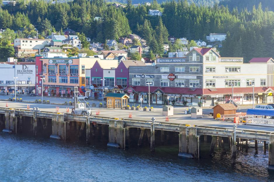 Alaskan waterfront with shops and buildings.