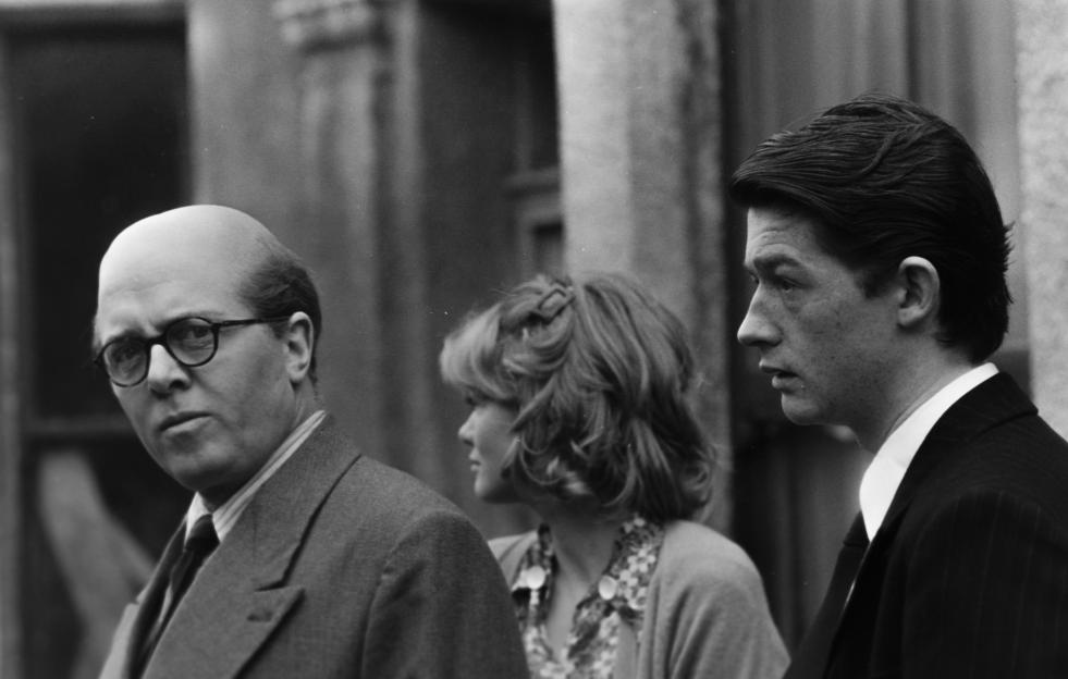 Black and white photo of John Hurt, Judy Geeson, and Richard Attenborough at a press call for 10 Rillington Place.