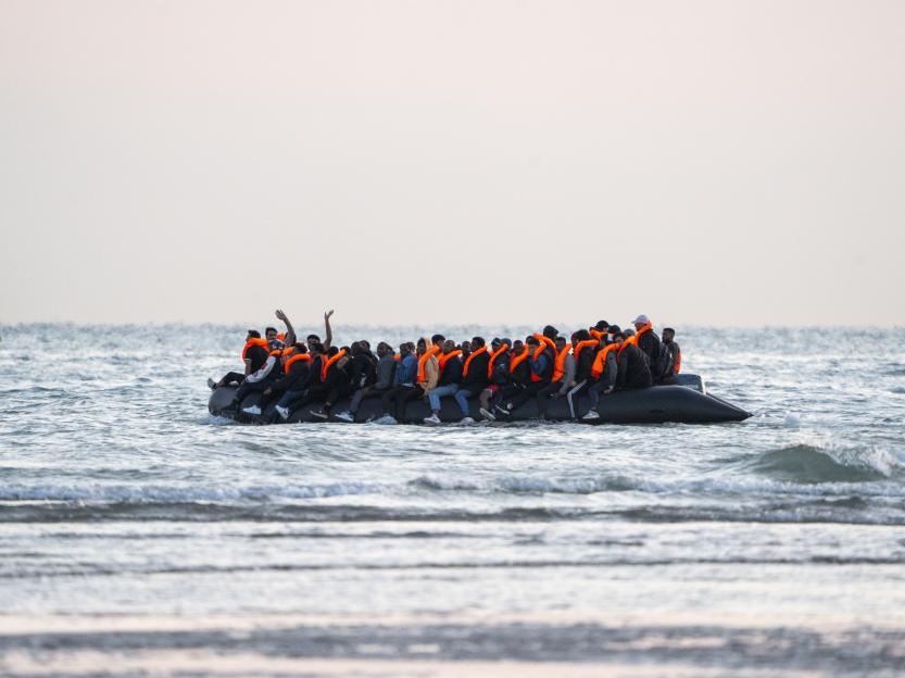 Record 125 migrants arrive on SINGLE ‘mega-dinghy’… hours before PM branded Farage’s migration plan ‘racist’