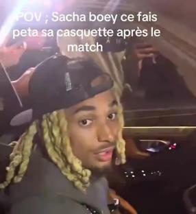 Man in car after a match.