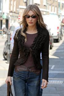 Bella Hadid leaving a chicken shop.