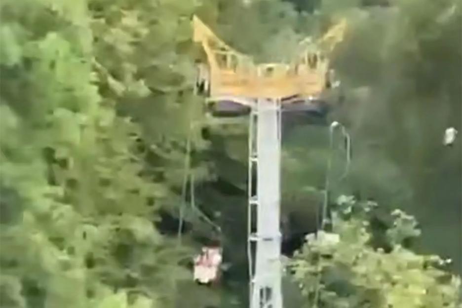 Horror moment chairlift COLLAPSES at Russian resort leaving 13 dangling in the air & four plunging into lake below