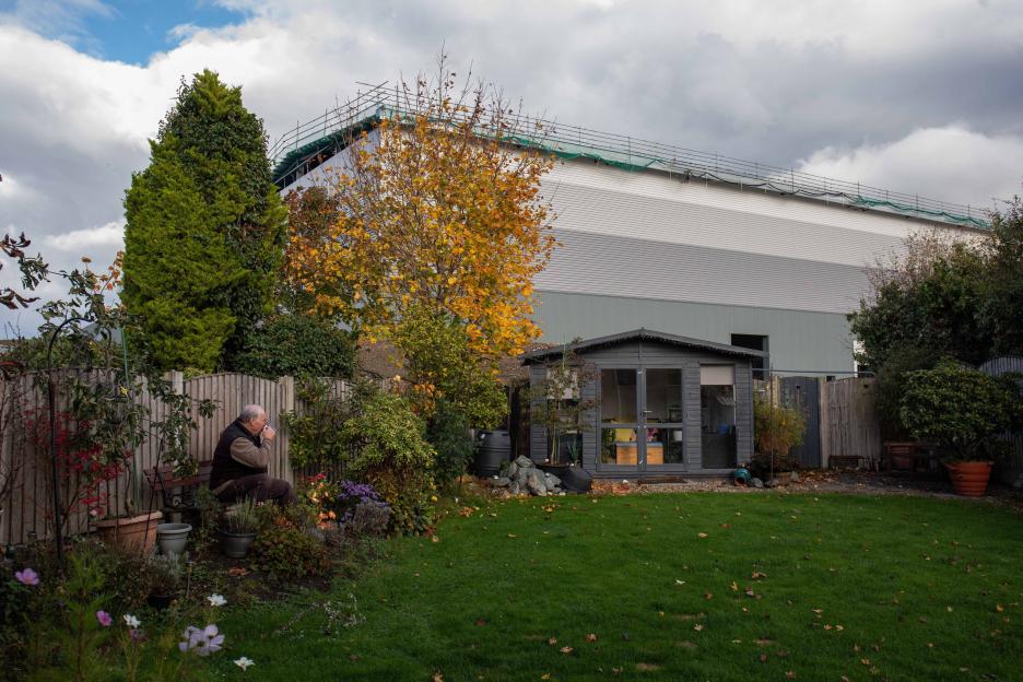 Residents in Tyldesley, Wigan, have homes dwarfed by giant warehouses