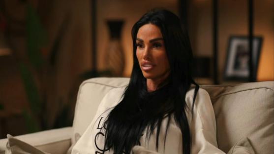 Screenshot of a woman sitting on a couch during an interview.