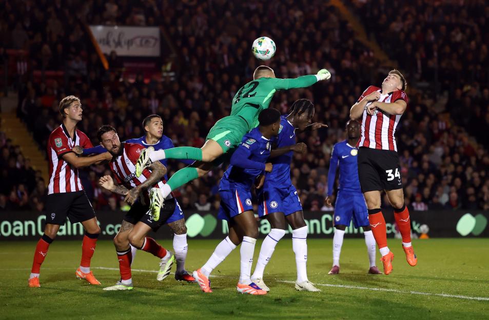 Chelsea goalkeeper Filip Joergensen fails to intercept a cross during the Carabao Cup Third Round match.