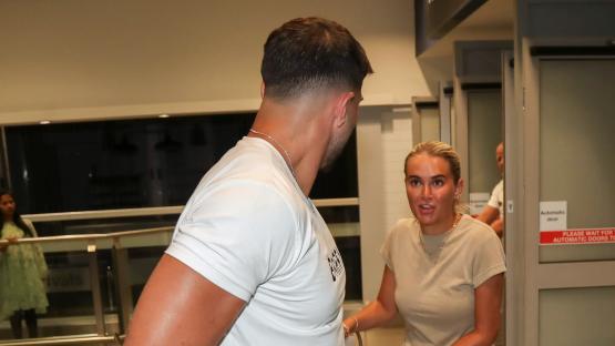 Molly-Mae Hague and Tommy Fury look miserable as they return from sixth holiday in five months